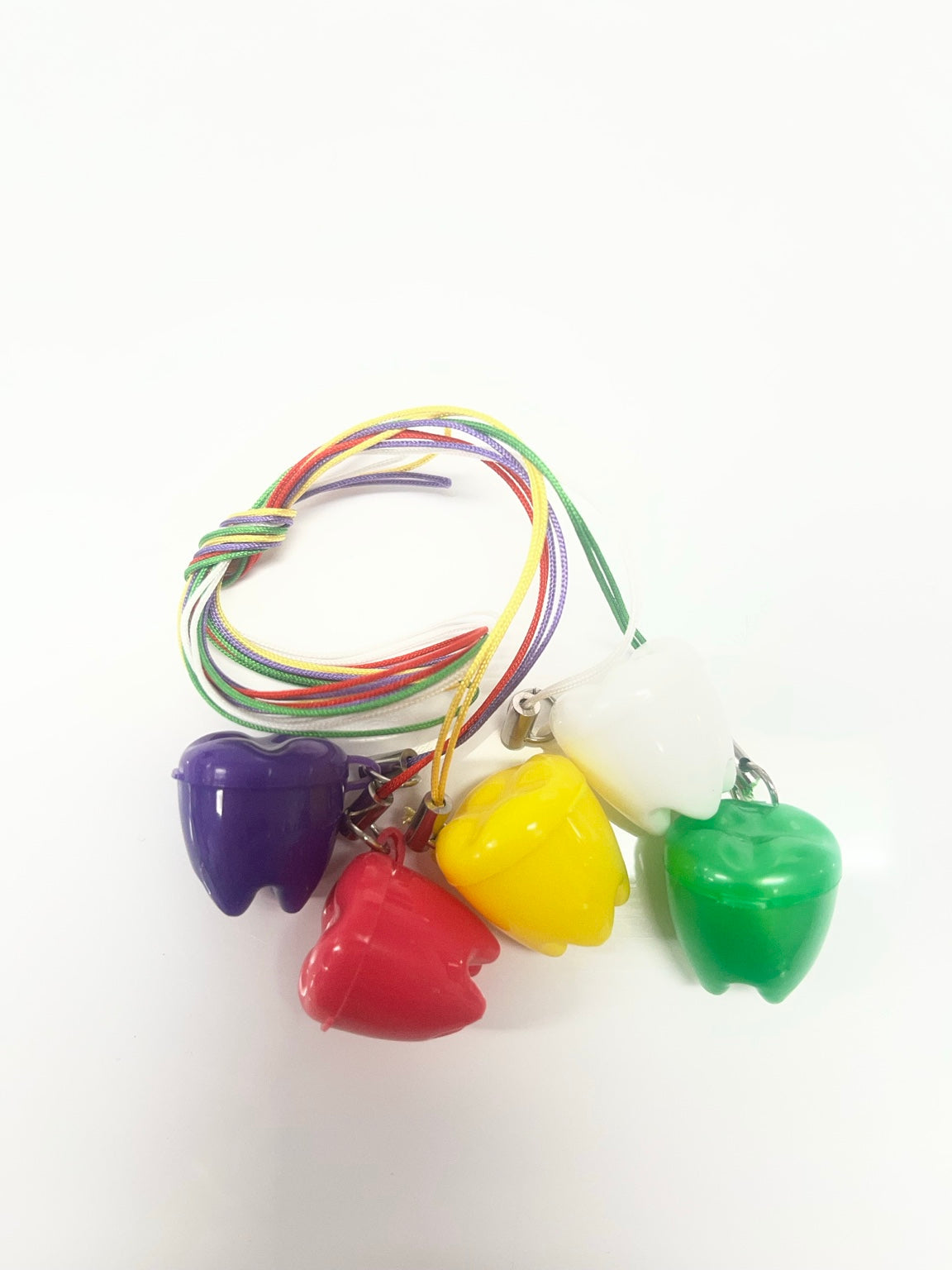 Pack of five colourful tooth-shaped necklace cases with cords